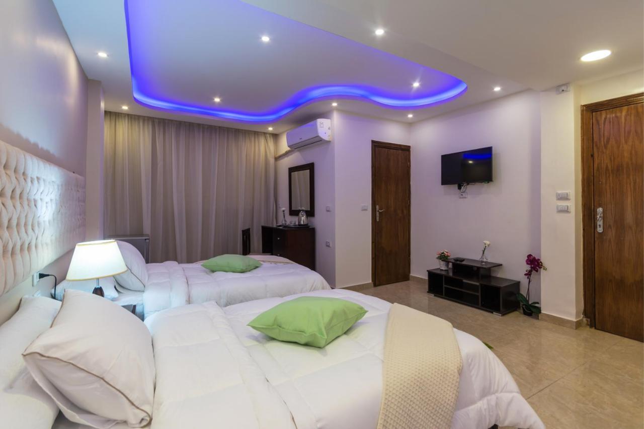 Amon Holiday Pyramids Inn Kafrat al Jabal Exterior photo